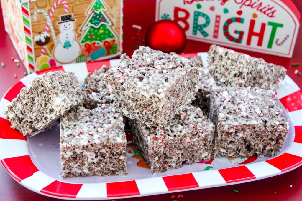 Cocoa Candy Cane Krispies Treats — chocolate rice krispie treats mixed with marshmallows and crushed candy canes for a fun Christmas dessert.