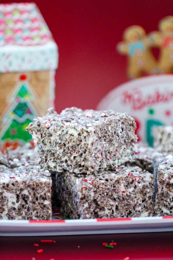 Cocoa Candy Cane Krispies Treats — chocolate rice krispie treats mixed with marshmallows and crushed candy canes for a fun Christmas dessert.