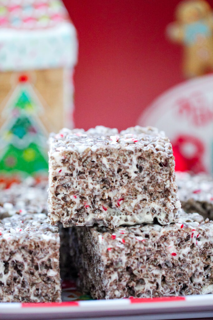 Cocoa Candy Cane Krispies Treats — chocolate rice krispie treats mixed with marshmallows and crushed candy canes for a fun Christmas dessert.