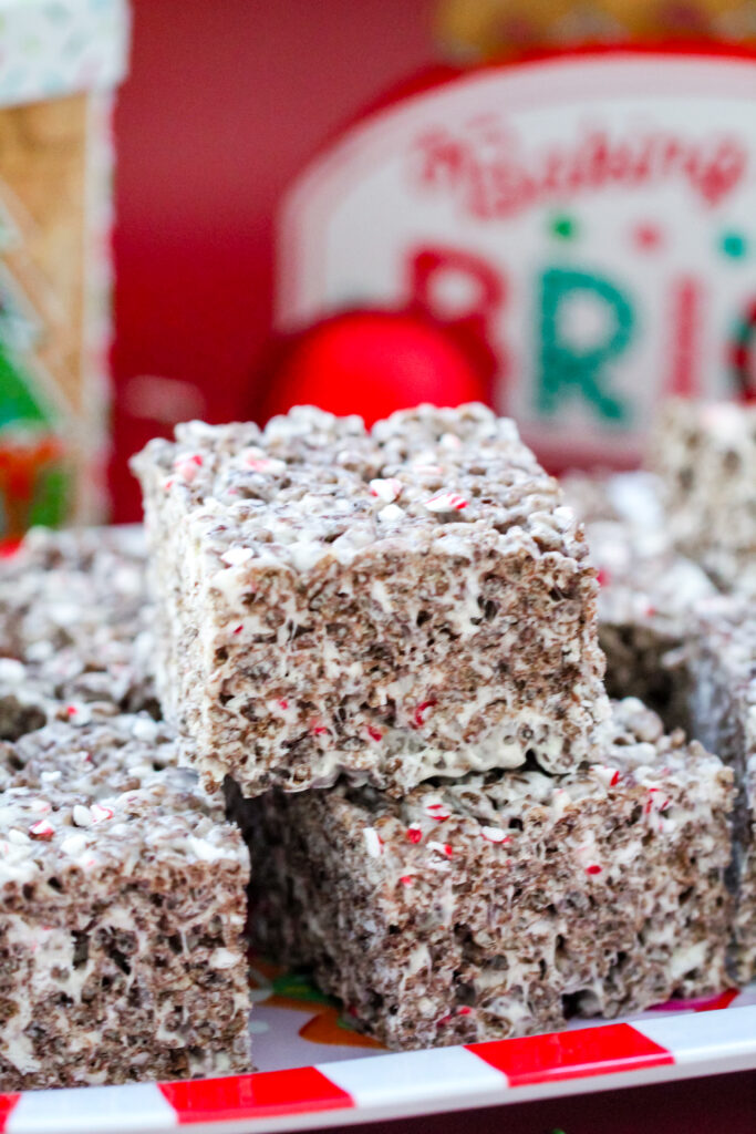 Cocoa Candy Cane Krispies Treats — chocolate rice krispie treats mixed with marshmallows and crushed candy canes for a fun Christmas dessert.