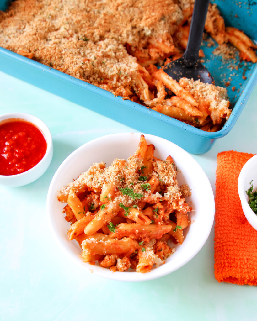 Close-up of creamy pasta bake topped with melted cheese