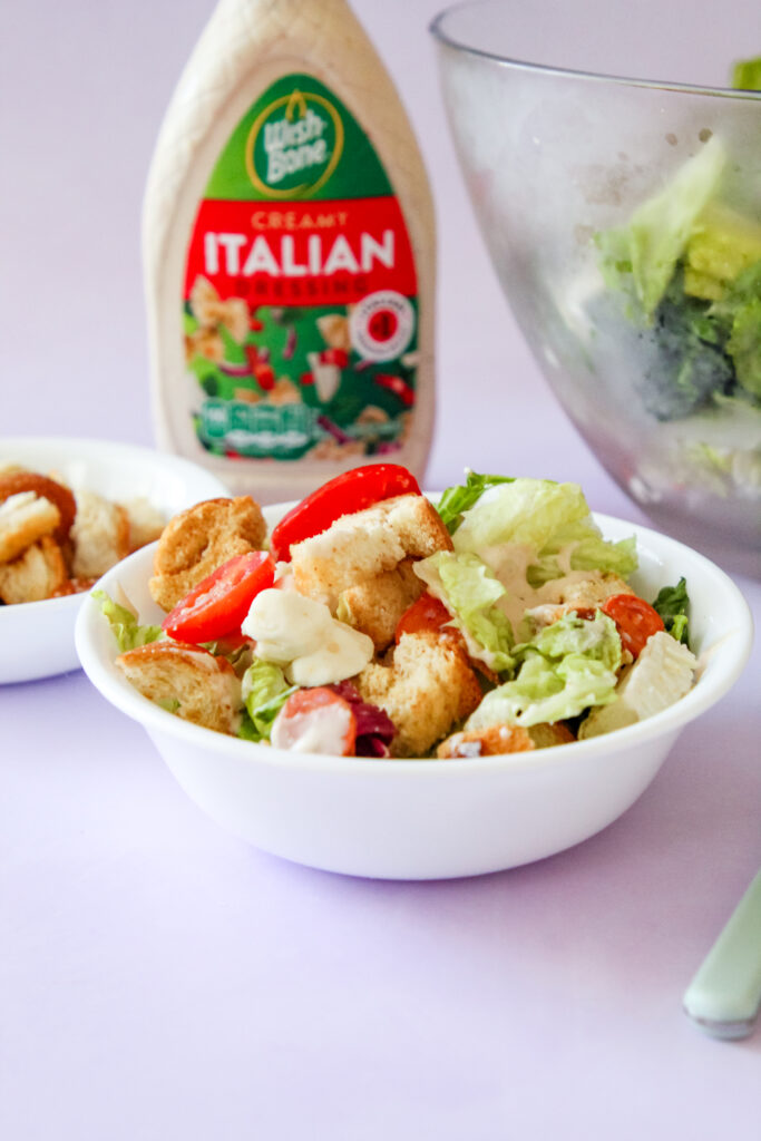 Fresh pizza-inspired salad with pepperoni, mozzarella, and crisp greens.