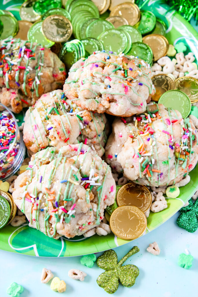 Jumbo bakery-style cookie with white chocolate chips, Lucky Charms cereal, and festive sprinkles.