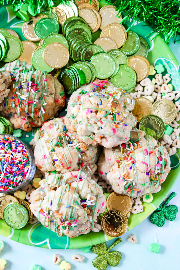 Jumbo bakery-style cookie with white chocolate chips, Lucky Charms cereal, and festive sprinkles.