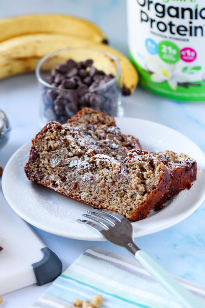 Freshly baked protein banana bread in a loaf pan, ready to be served.