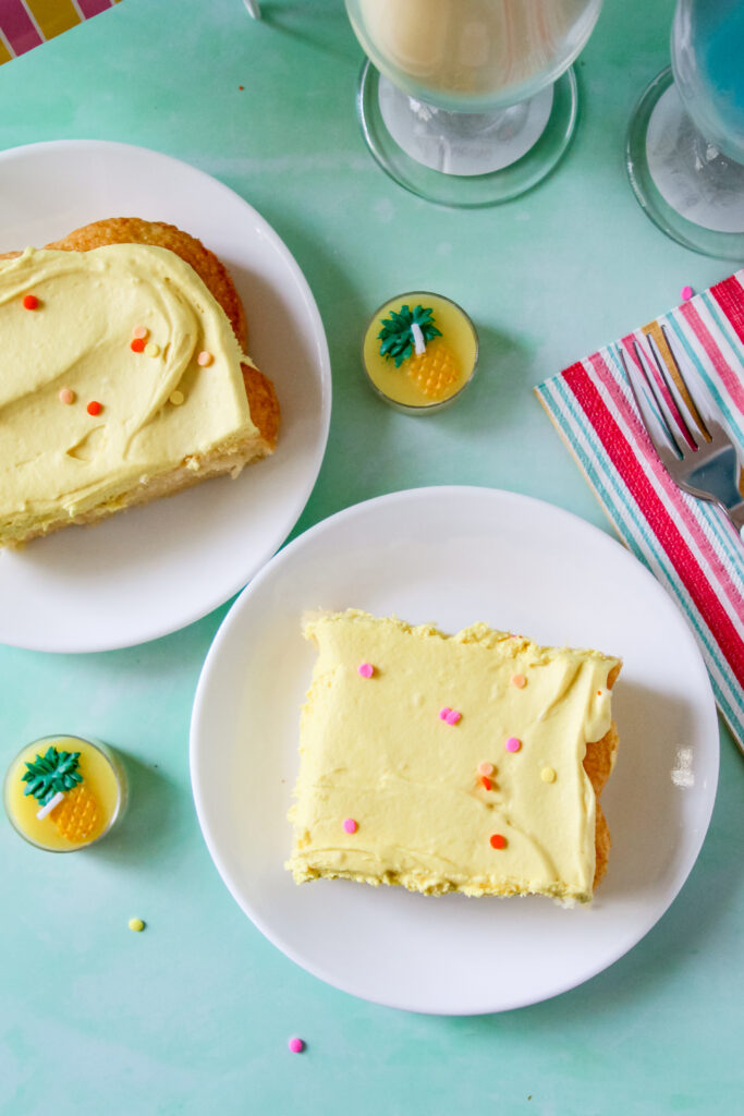 A slice of Pineapple Party Sheet Cake.
