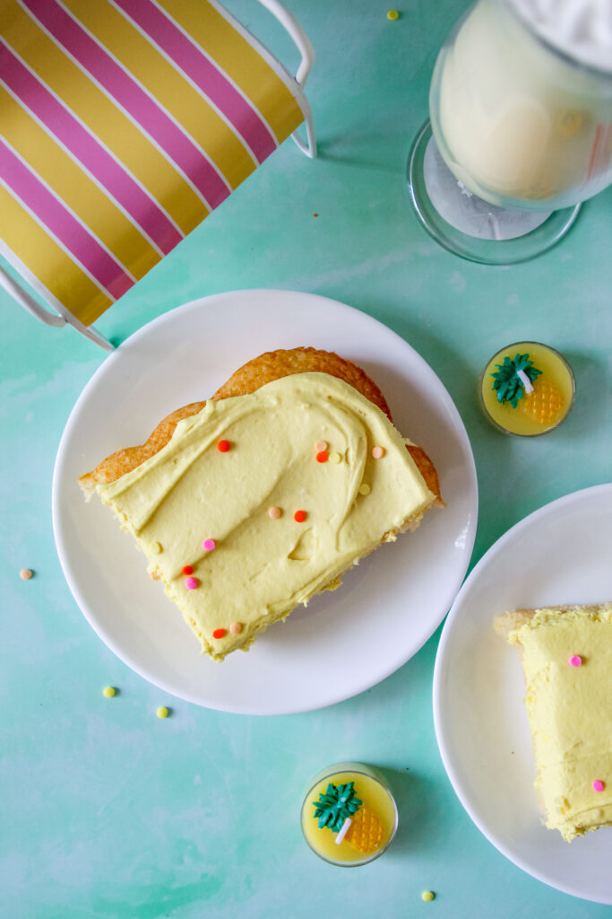 A slice of Pineapple Party Sheet Cake.