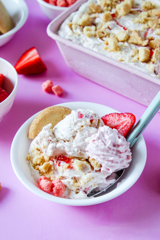An overhead shot of a bowl of Strawberry Shortcake No-Churn Ice Cream.