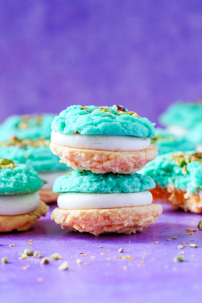 A side view of Pistachio and Orange Blossom Cookie Sandwiches Inspired by Jasmine from Aladdin.