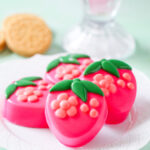 Chocolate covered Oreos in the shape of strawberries.