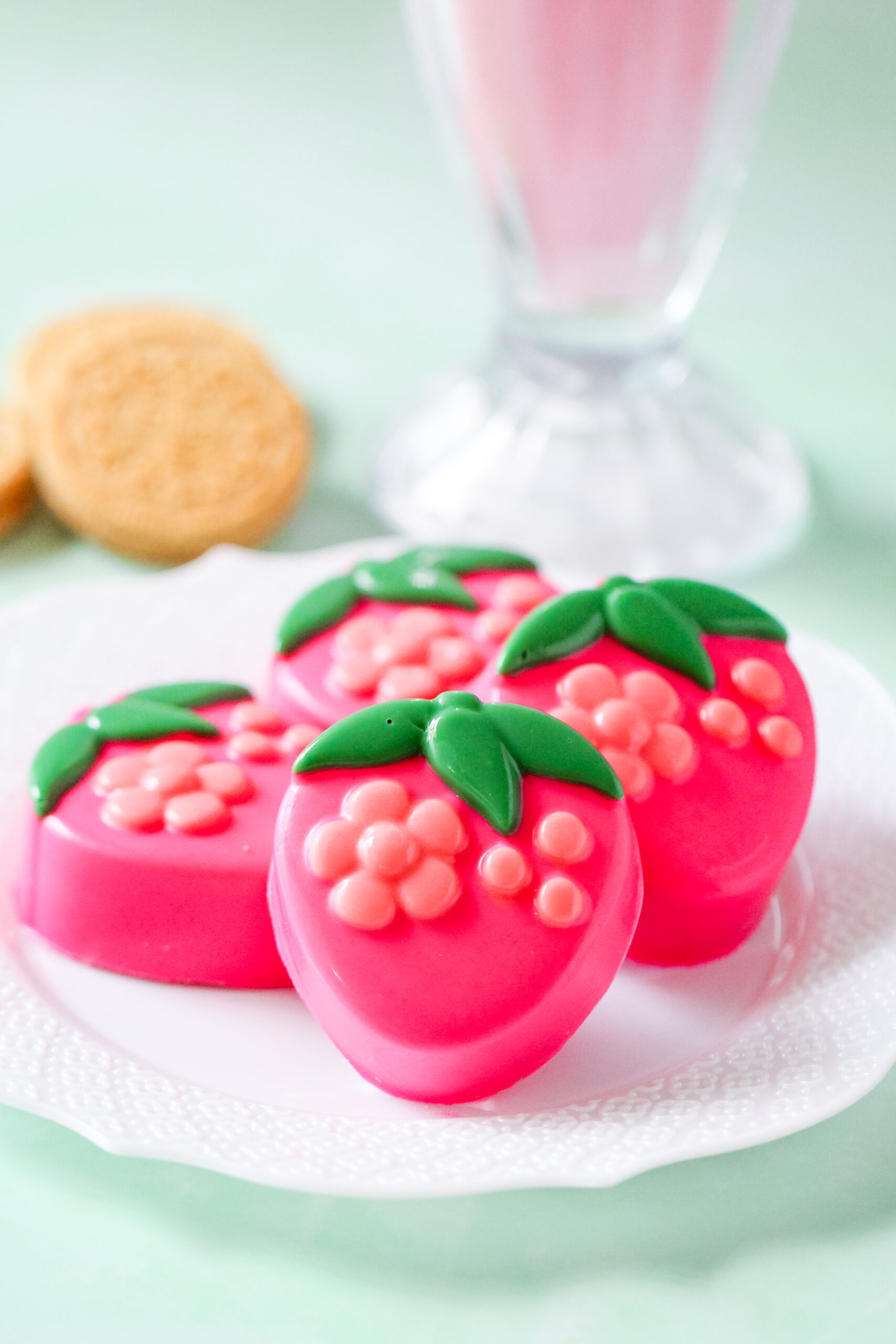 Chocolate covered Oreos in the shape of strawberries.