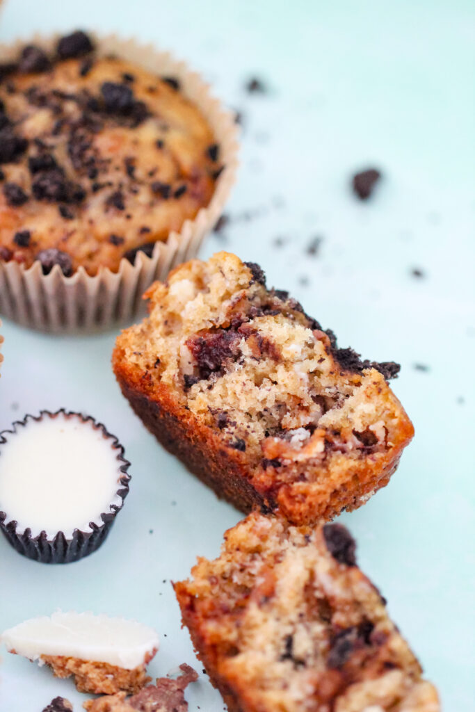 Inside picture of Banana Butter Cup Crunch Muffins: moist banana muffins studded with peanut butter cup chunks and Oreo crumbs