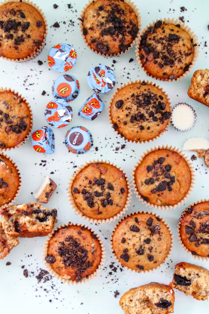 Banana Butter Cup Crunch Muffins: moist banana muffins studded with peanut butter cup chunks and Oreo crumbs