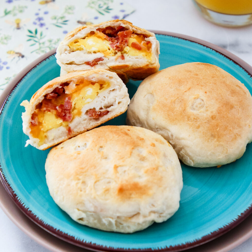 Morning Surprise Biscuit Bites using Grand Biscuits showing the inside filled with eggs, cheese, and bacon.