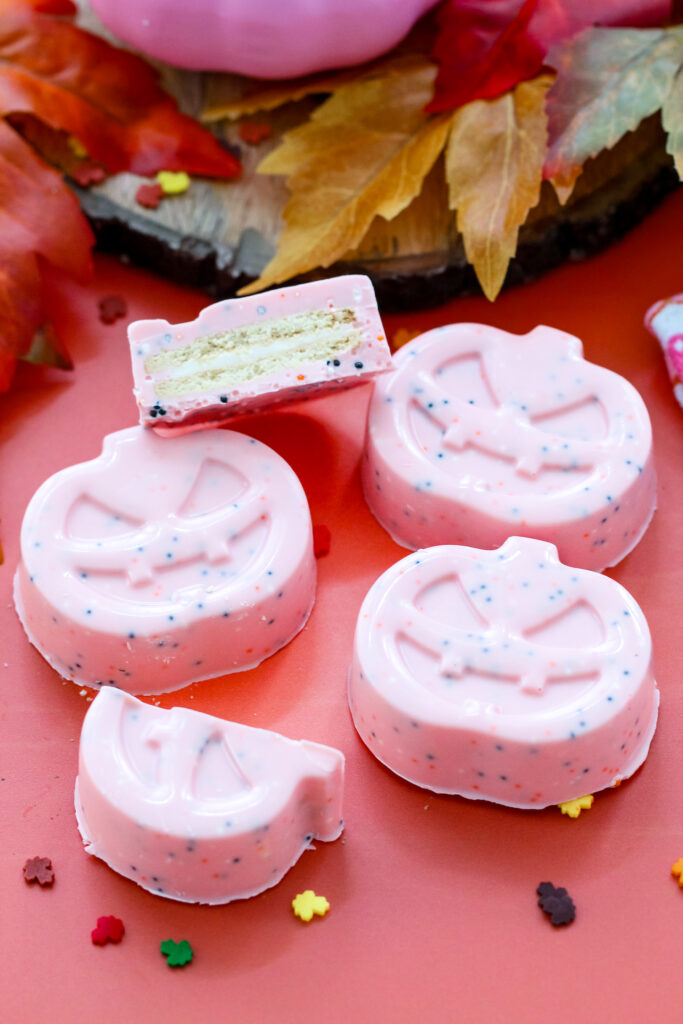 Image of the inside of a Sprinkled Pink Pumpkin Covered Cookies perfect for Halloween.
