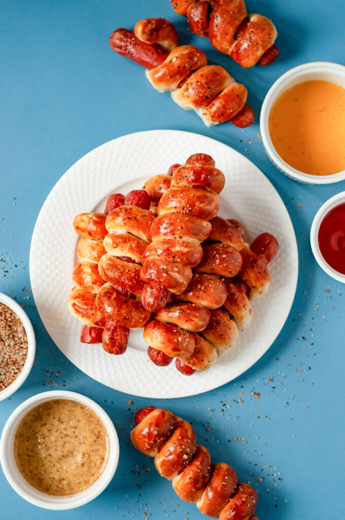Twisted Air Fryer Hot Dogs — spiral-cut hot dogs wrapped in flaky Pillsbury Grand biscuits and air-fried until golden and crisp.