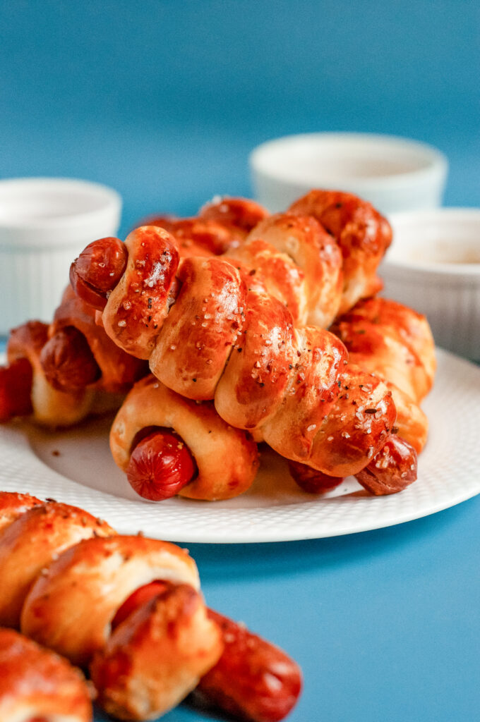 Twisted Air Fryer Hot Dogs — spiral-cut hot dogs wrapped in flaky Pillsbury Grand biscuits and air-fried until golden and crisp.