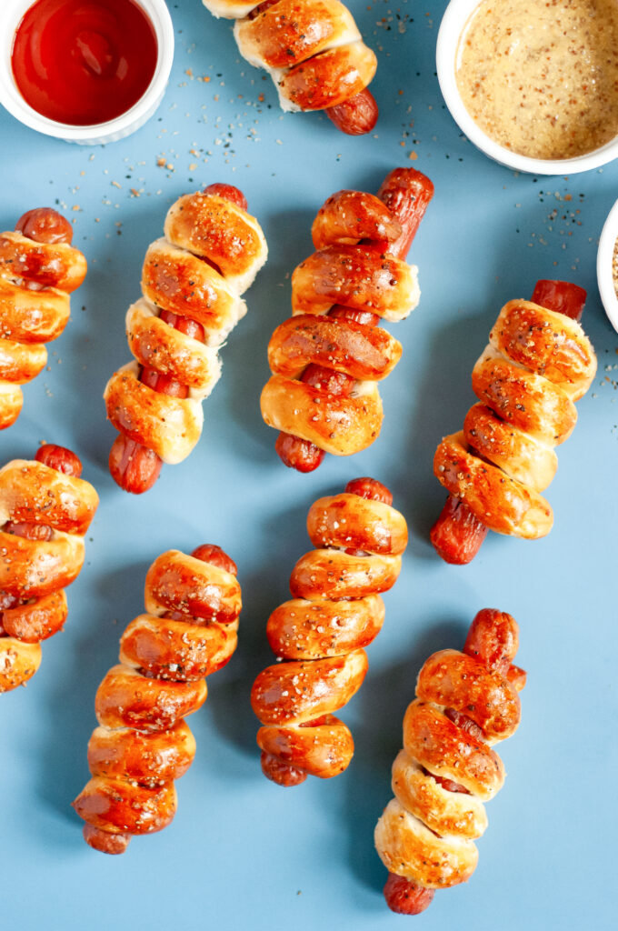 Twisted Air Fryer Hot Dogs — spiral-cut hot dogs wrapped in flaky Pillsbury Grand biscuits and air-fried until golden and crisp.