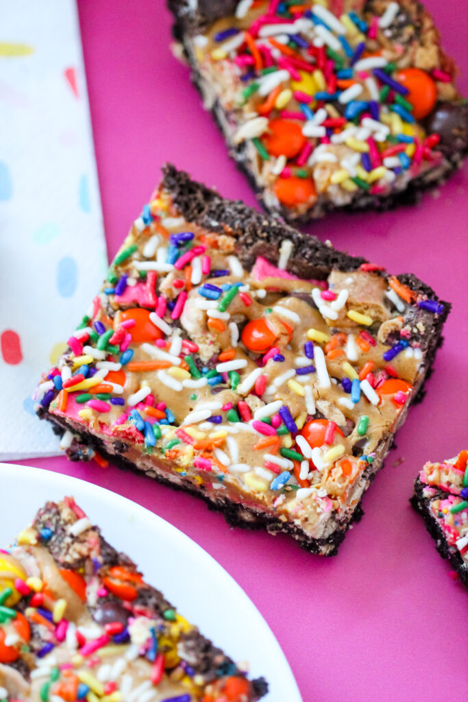 Peanut Butter Party Brownies with Reese's chopped in and rainbow sprinkles on top. 