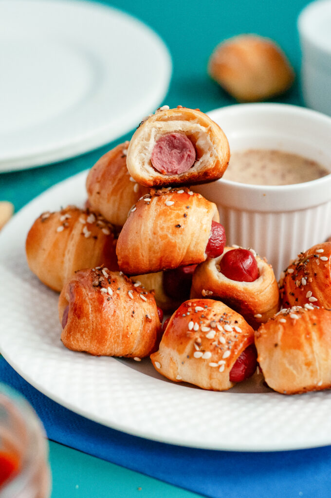 Hot dogs wrapped in crescent rolls with everything bagel seasoning.
