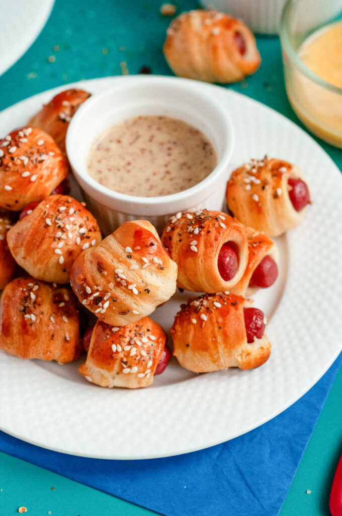 Hot dogs wrapped in crescent rolls with everything bagel seasoning.