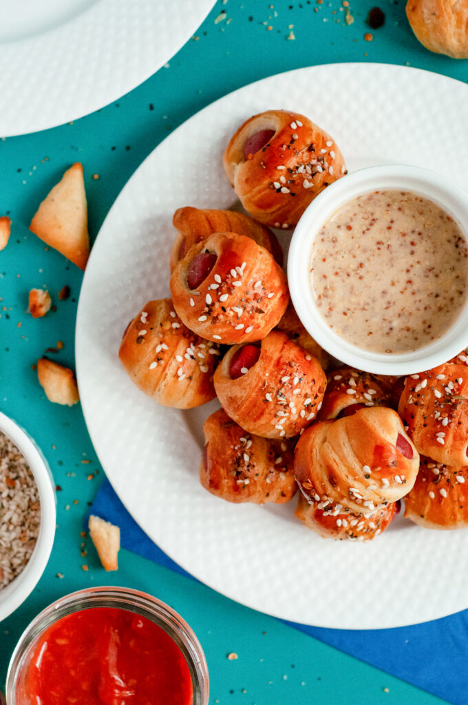 Hot dogs wrapped in crescent rolls with everything bagel seasoning.